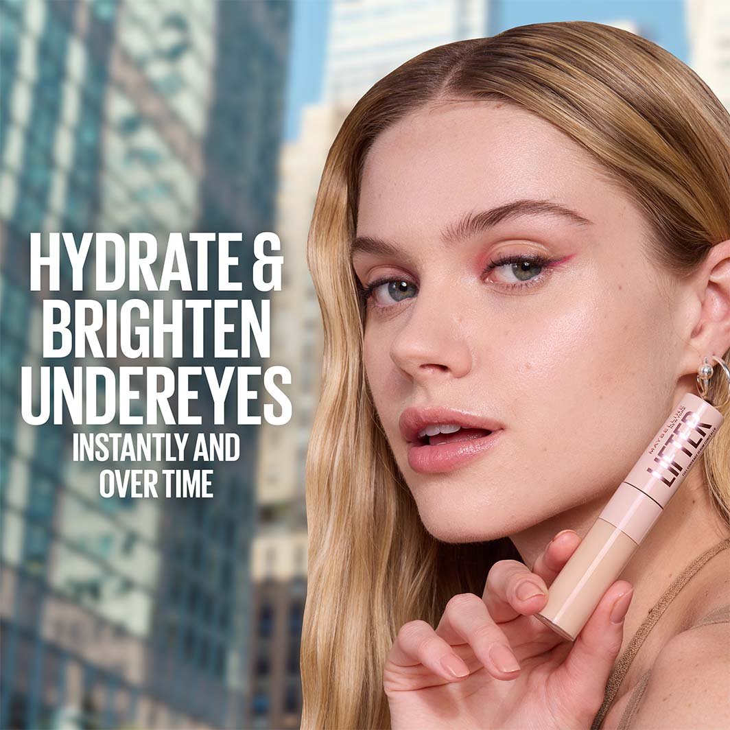 Product shot of Maybelline Lifter Concealer held near the face, with text reading “Hydrate & Brighten Undereyes Instantly and Over Time”.